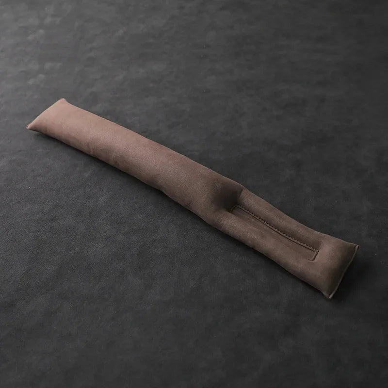 Suede seat gap filler cushion