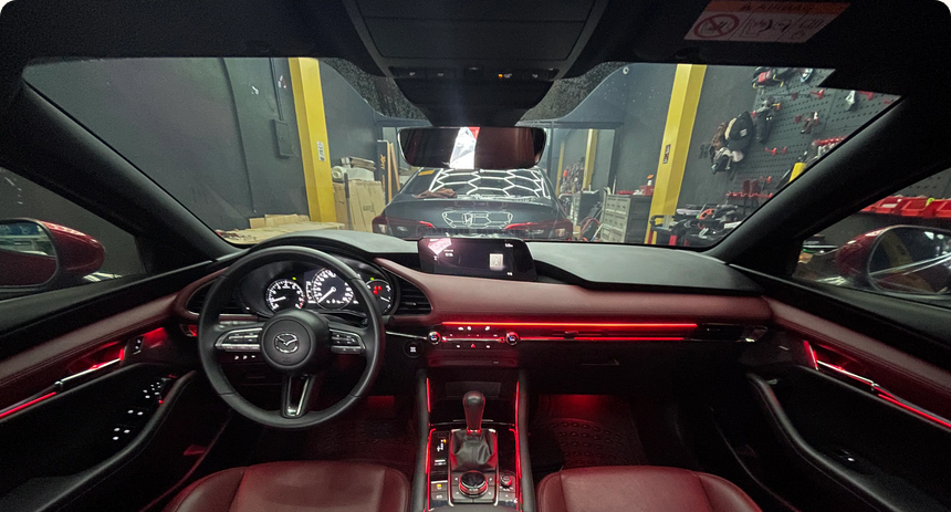 Monochrome or RGB LED ambient lighting with interior doors, dashboard, seats