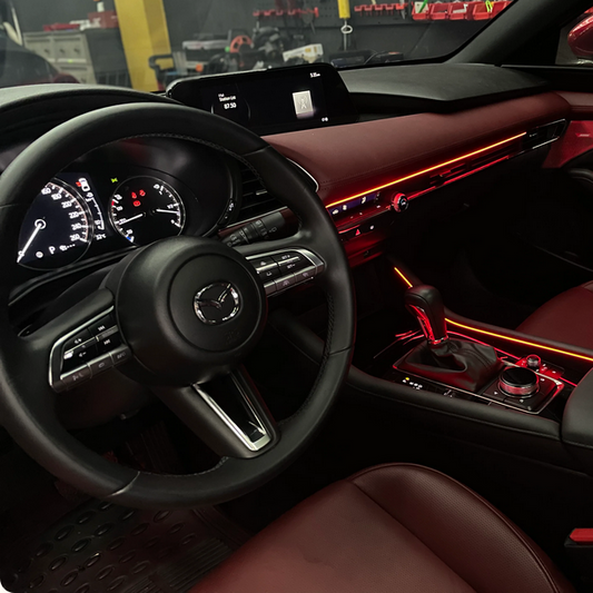 Monochrome or RGB LED ambient lighting with interior doors, dashboard, seats