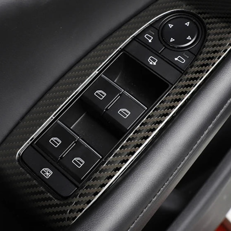 Decorative cover for window regulator buttons