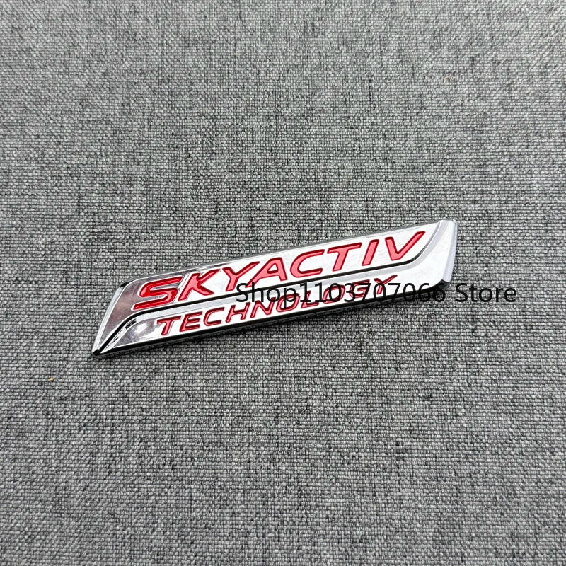 Badge SKYACTIV 3D Chromé ou Noir pour Hayon – Mazda