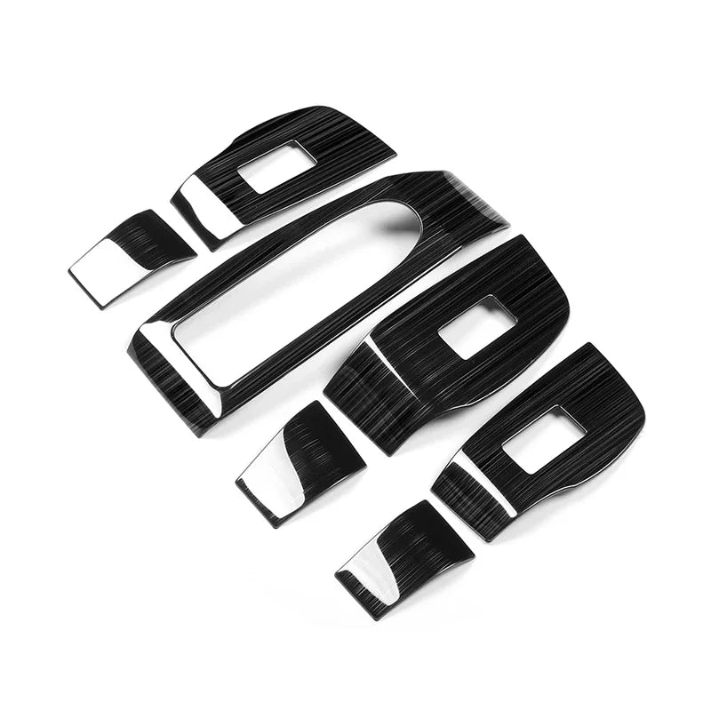 Decorative cover for window regulator buttons