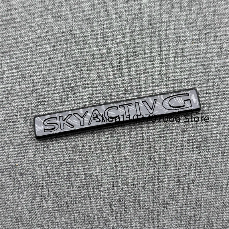 Badge SKYACTIV 3D Chromé ou Noir pour Hayon – Mazda