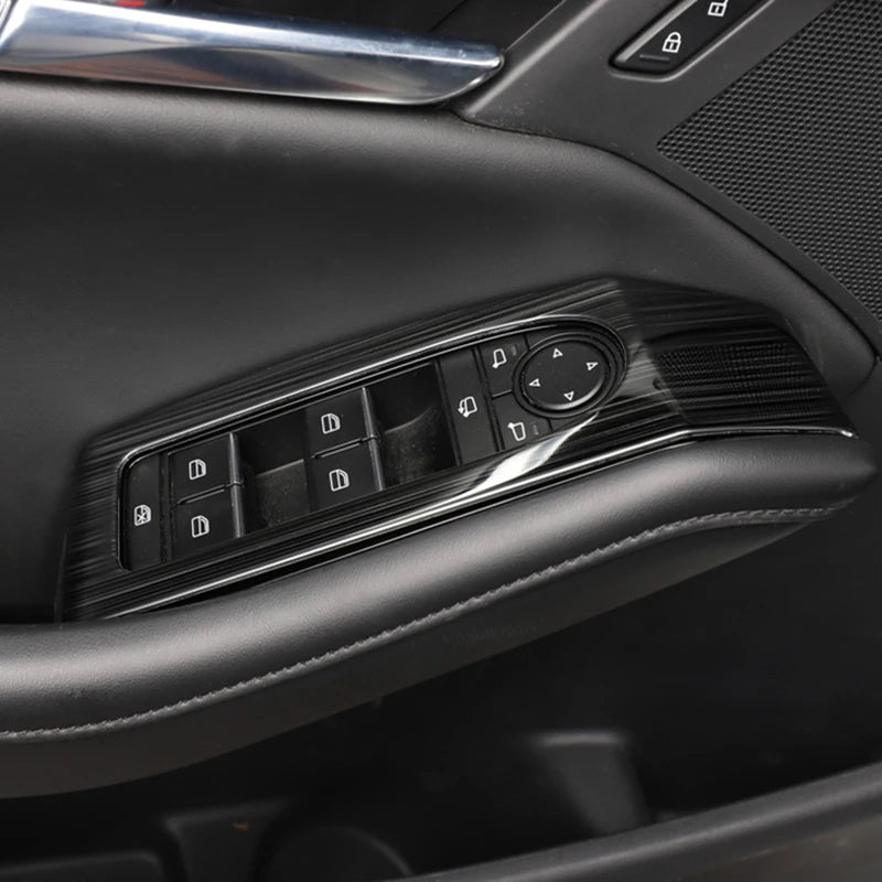 Decorative cover for window regulator buttons