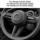 Suede steering wheel button trim protection