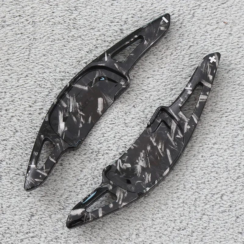 ABS steering wheel paddle extensions