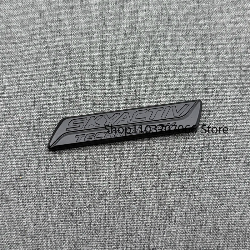 Badge SKYACTIV 3D Chromé ou Noir pour Hayon – Mazda