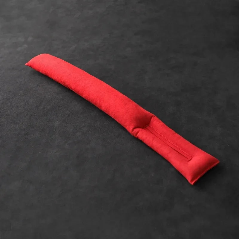 Suede seat gap filler cushion