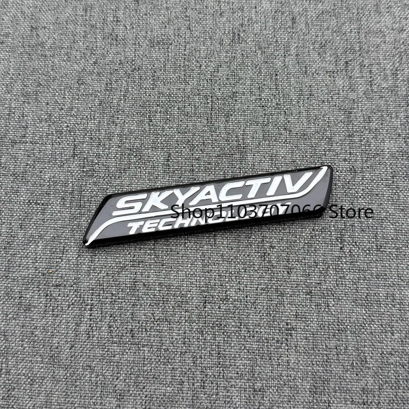 Badge SKYACTIV 3D Chromé ou Noir pour Hayon – Mazda