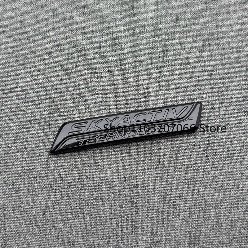 Badge SKYACTIV 3D Chromé ou Noir pour Hayon – Mazda