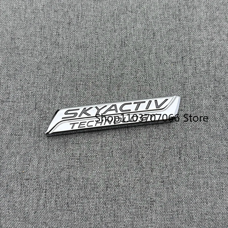 Badge SKYACTIV 3D Chromé ou Noir pour Hayon – Mazda
